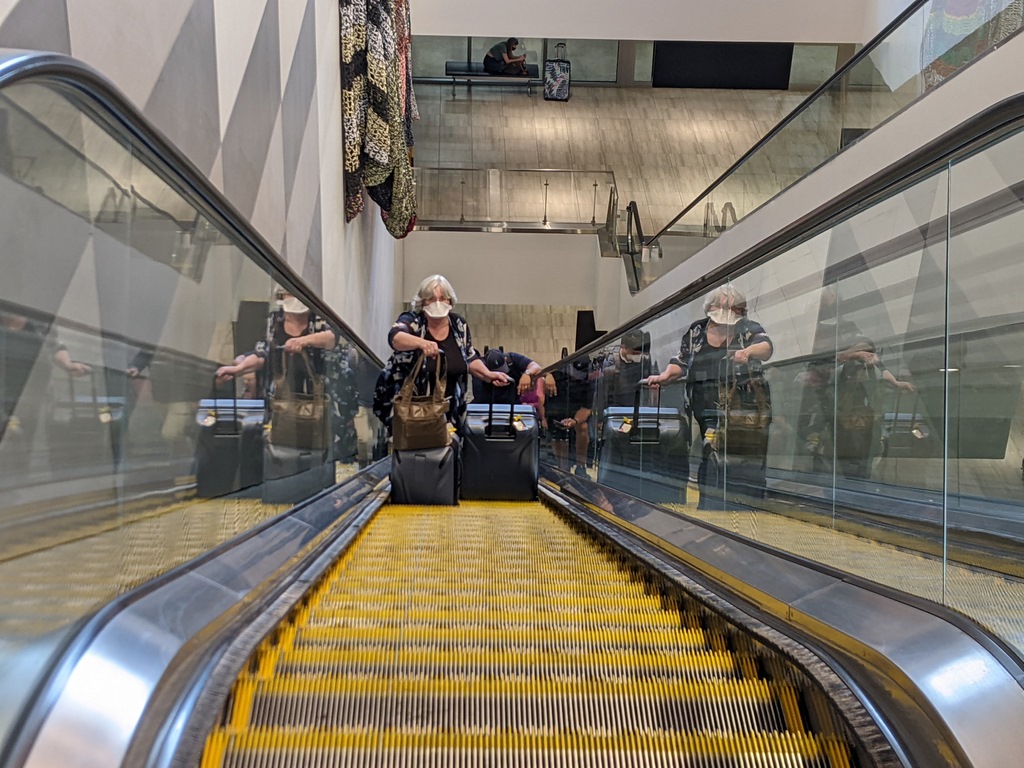 1215B_CathieOnTPA_Escalator.jpg