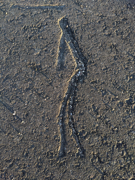 0312B_KokopelliInLovelandAsphalt.jpg
