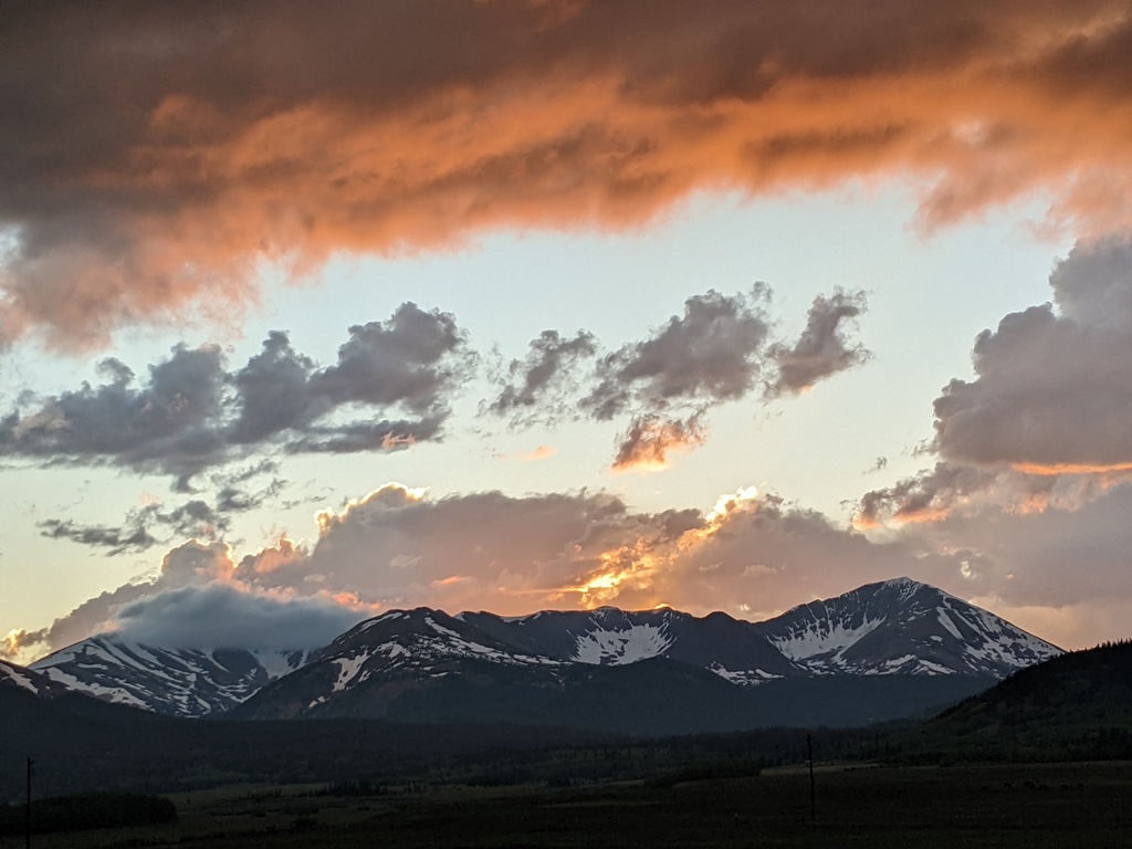 J6_SunsetCloudsOverGuyotZoom.jpg