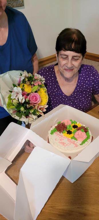 B1_MomWithFlowersAndCake.jpg