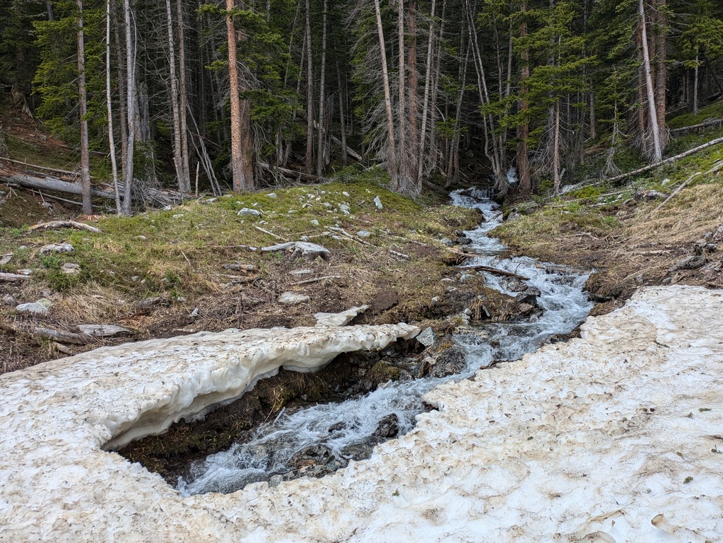 C4_CrossingSnowAboveCreek.jpg