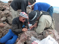 Scott repairing the plaque