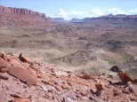 Raj sitting below on Castle Butte slope
