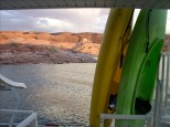 Kayaks on back of houseboat